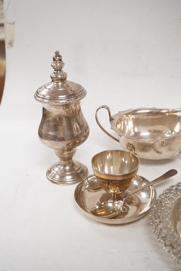 A group of assorted small silver including an Elizabeth II small circular dish by Stuart Devlin, London, 1985, diameter 13.5cm, a sauceboat, a 1920's seven bar toastrack, two pedestal salts including late Victorian, an e